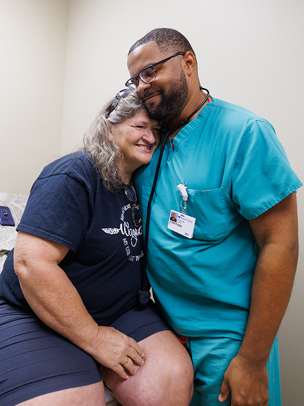 Dr. Jonathan Buchanan’s (‘14) patient, Bonnie Scott, is his former substitute teacher. Now, he’s the one giving her tests.